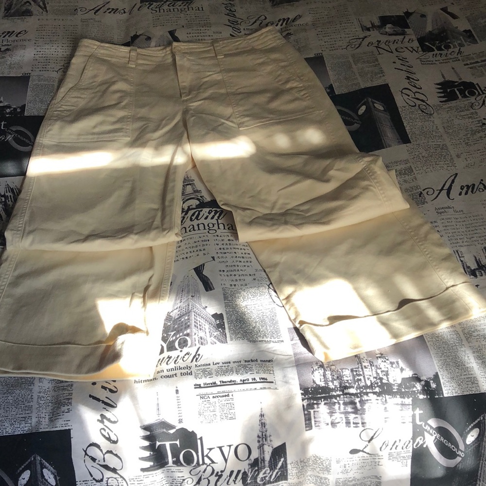 Cream, high rise, and wide leg pant.